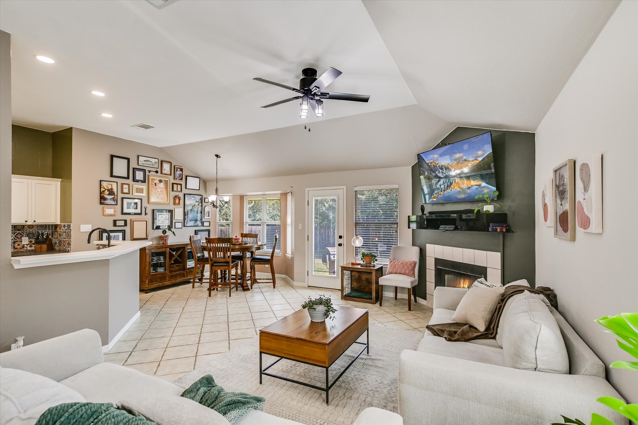 1302 Redbud Lane Leander, TX 78641 - Photo 11 of 28 a living room with fireplace furniture and a flat screen tv