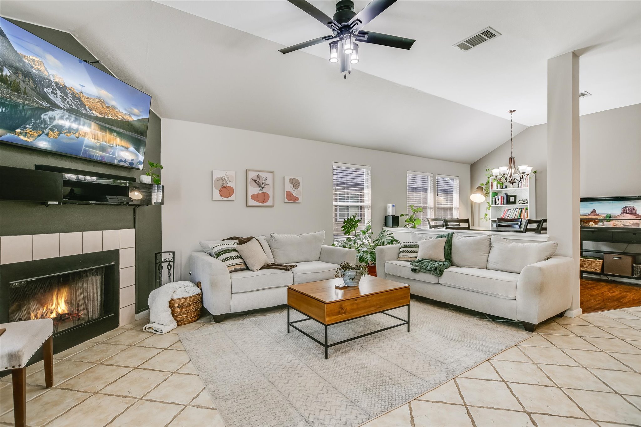 1302 Redbud Lane Leander, TX 78641 - Photo 12 of 28 a living room with furniture and a fireplace