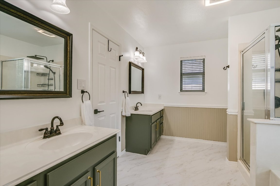 1302 Redbud Lane Leander, TX 78641 - Photo 16 of 28 a bathroom with a sink double vanity