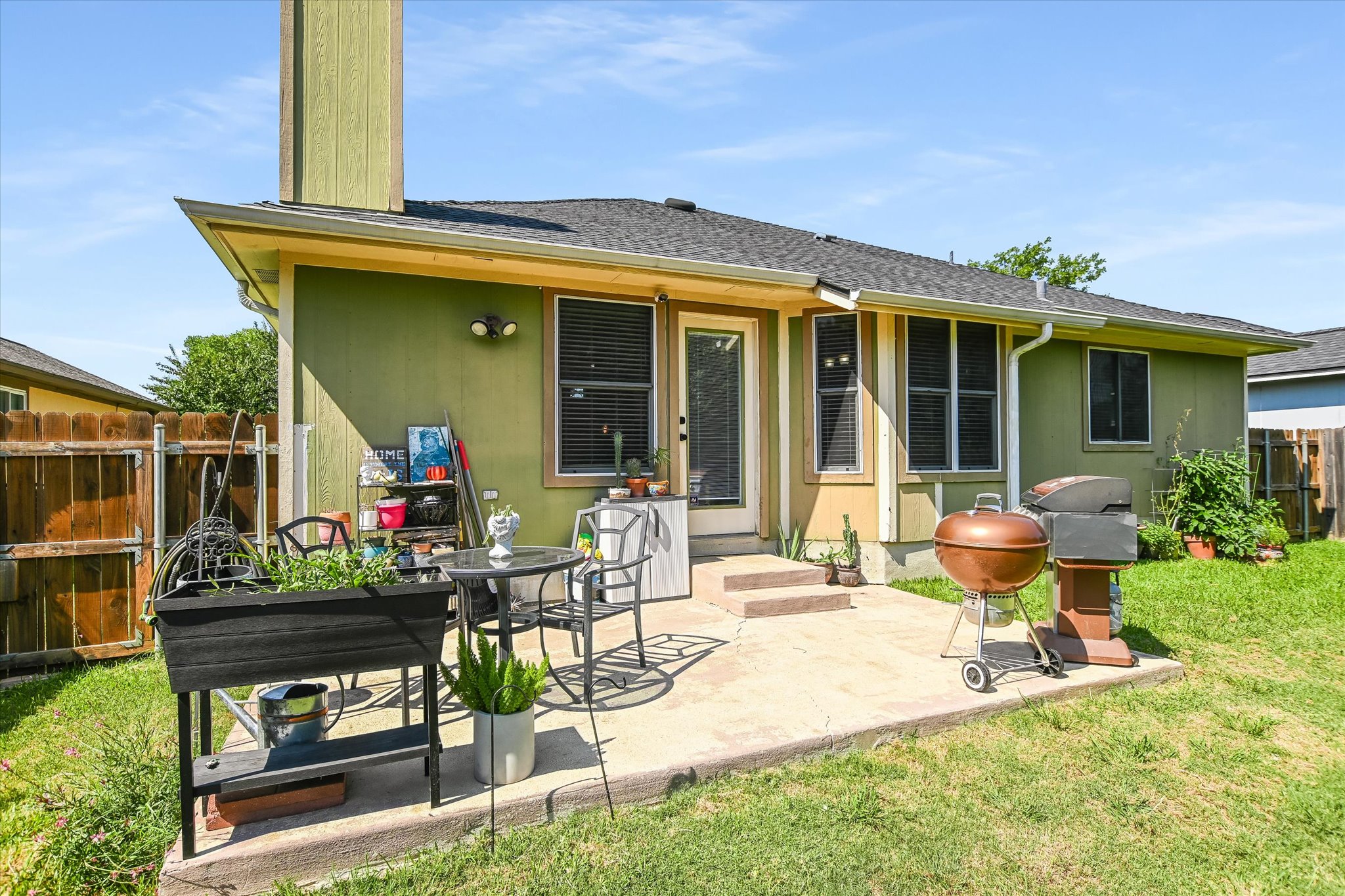 1302 Redbud Lane Leander, TX 78641 - Photo 20 of 28 Patio perfect space to BBQ, picnic table, outdoor furniture, great space to hangout