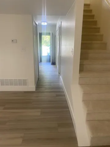 a room with a bed and a window