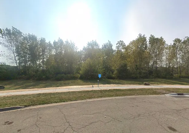 a view of a backyard of a house