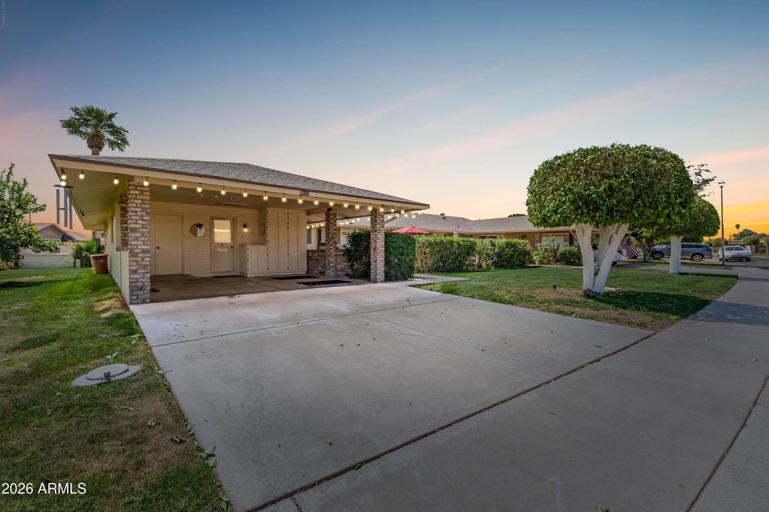 a view of a house with a yard