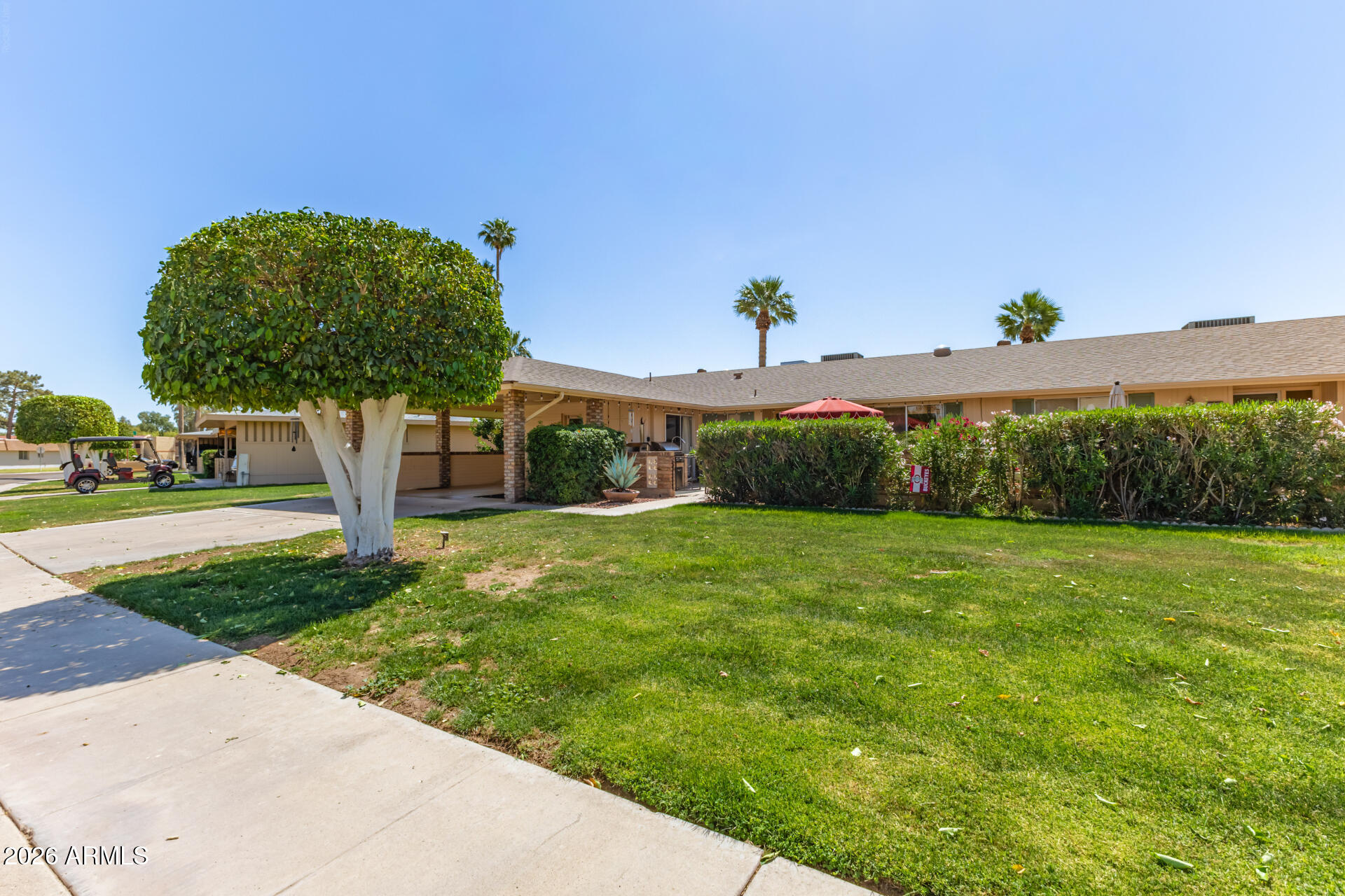 9933 West Mountain View Road Sun City, AZ 85351 - Photo 4 of 24 a view of a back yard