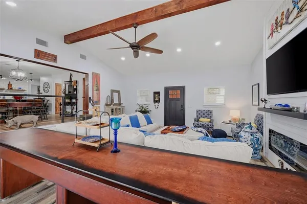 a view of a living room and dining room