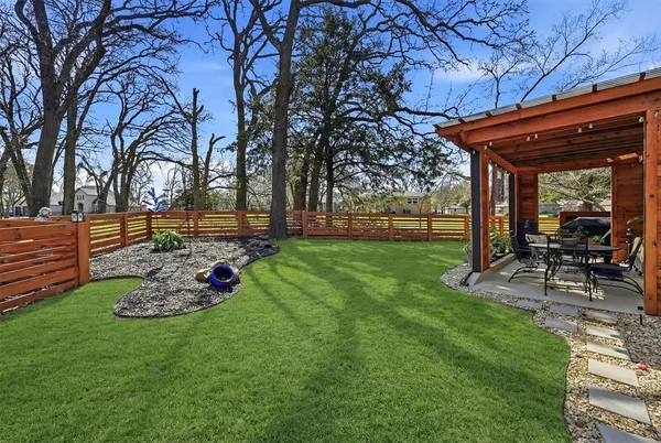 a garden view with a seating space