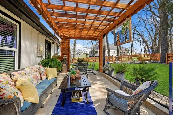 a view of yard with patio