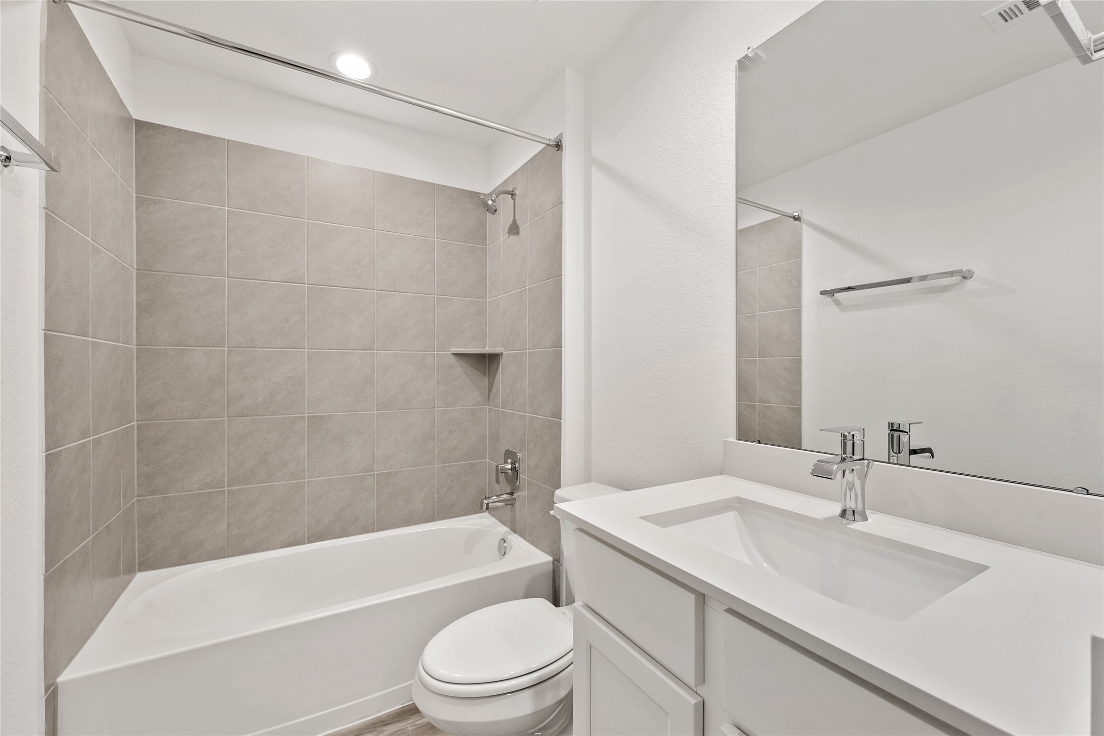 714 Boer Plains Drive Rosharon, TX 77583 - Photo 4 of 11 a bathroom with a granite countertop bathtub shower sink mirror vanity and toilet