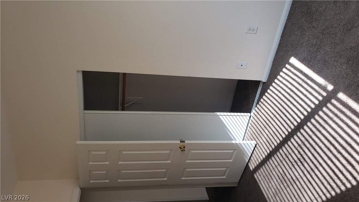 9112 Manalang Road Las Vegas, NV 89123 - Photo 43 of 50 A deep closet with a rod offers ample storage for belongings.