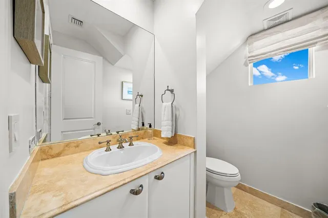 a view of a livingroom with furniture and a rug