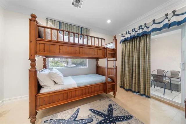 a view of a balcony with wooden floor