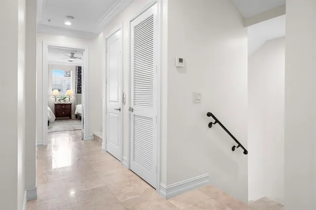 a area with furniture a washer and dryer