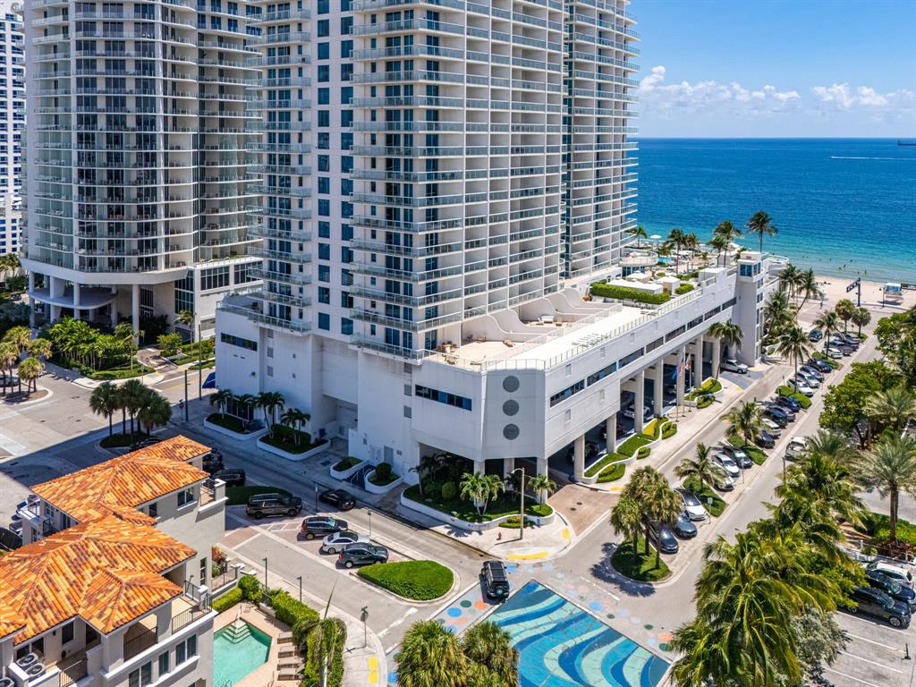 514 North Birch Road Fort Lauderdale, FL 33304 - Photo 69 of 78 a view of a balcony with chairs and potted plants