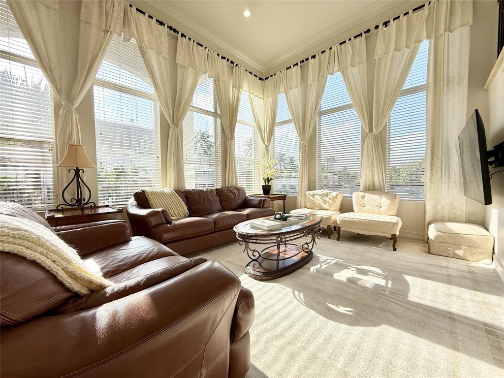 514 North Birch Road Fort Lauderdale, FL 33304 - Photo 7 of 78 a living room with furniture and a large window