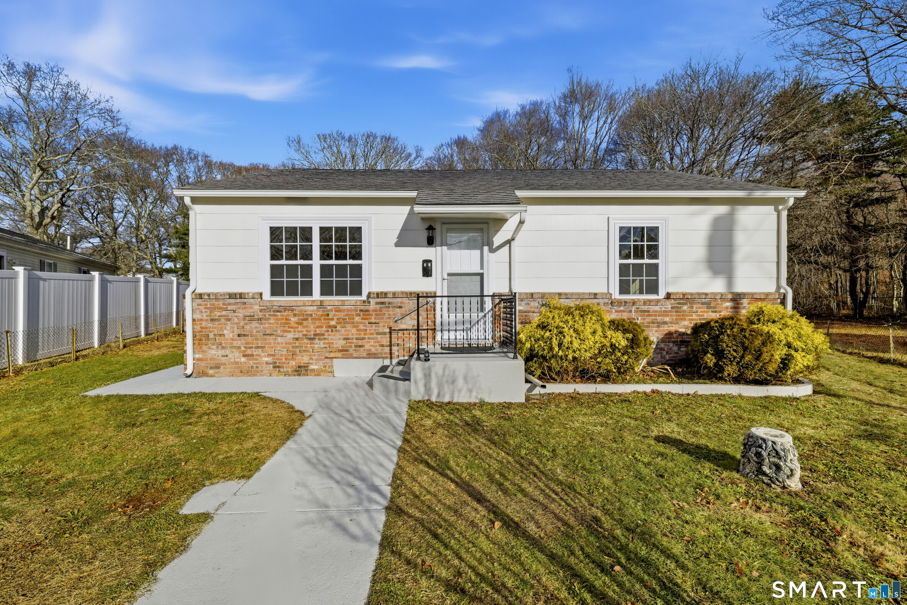 a front view of house with yard outdoor seating and yard