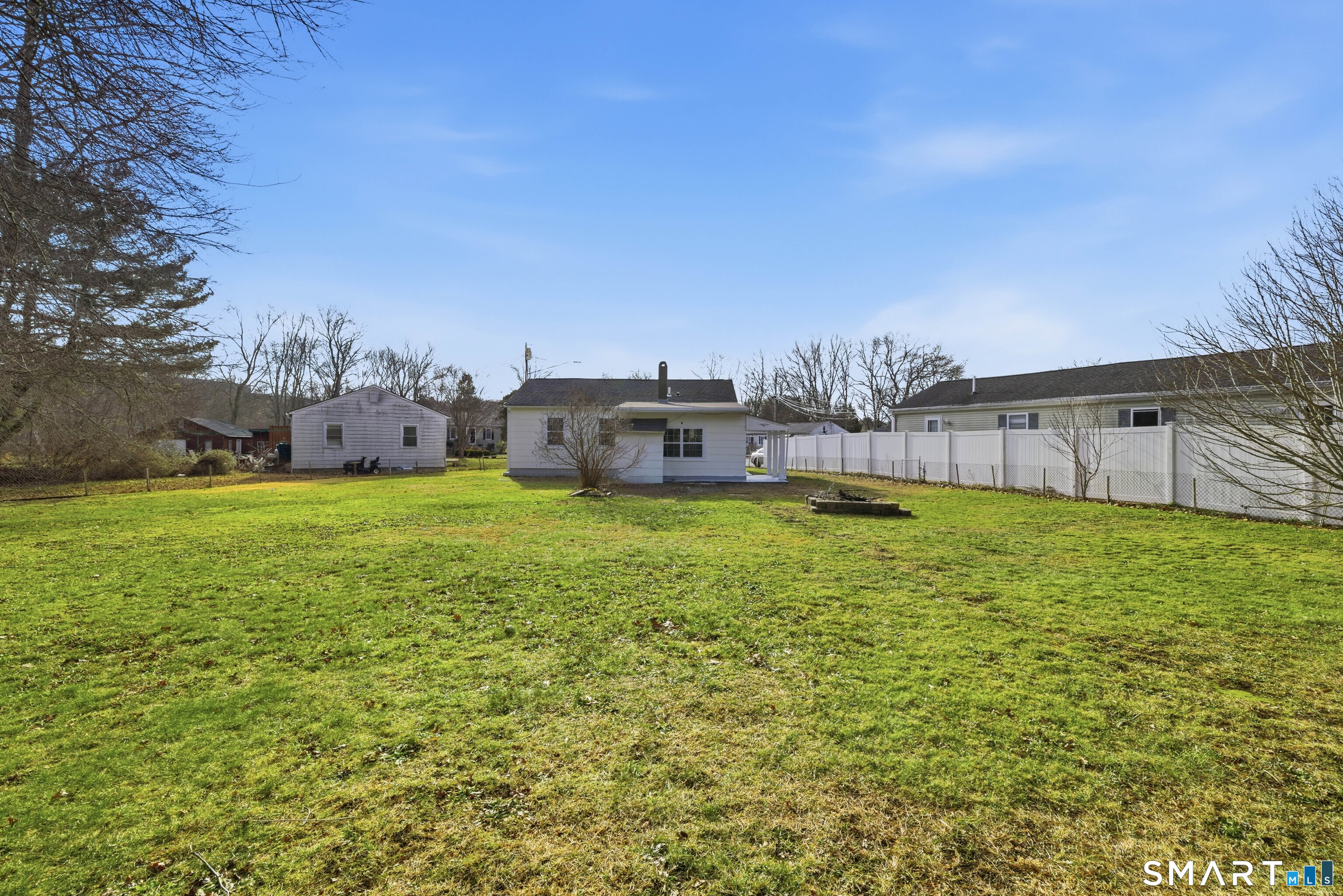 32 Concord Court Groton, CT 06340 - Photo 20 of 24 a view of a house with backyard and a tree