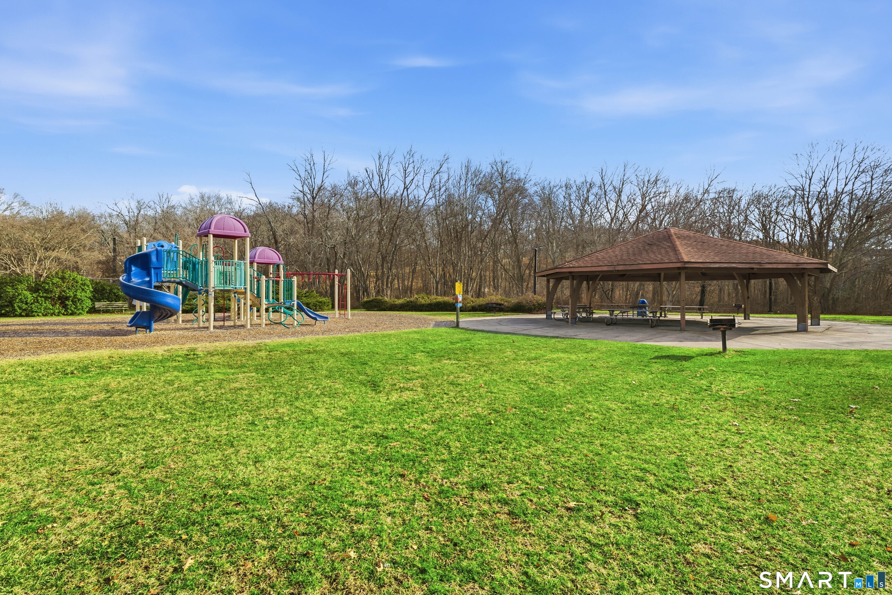 32 Concord Court Groton, CT 06340 - Photo 23 of 24 a view of a big yard with a house in the background