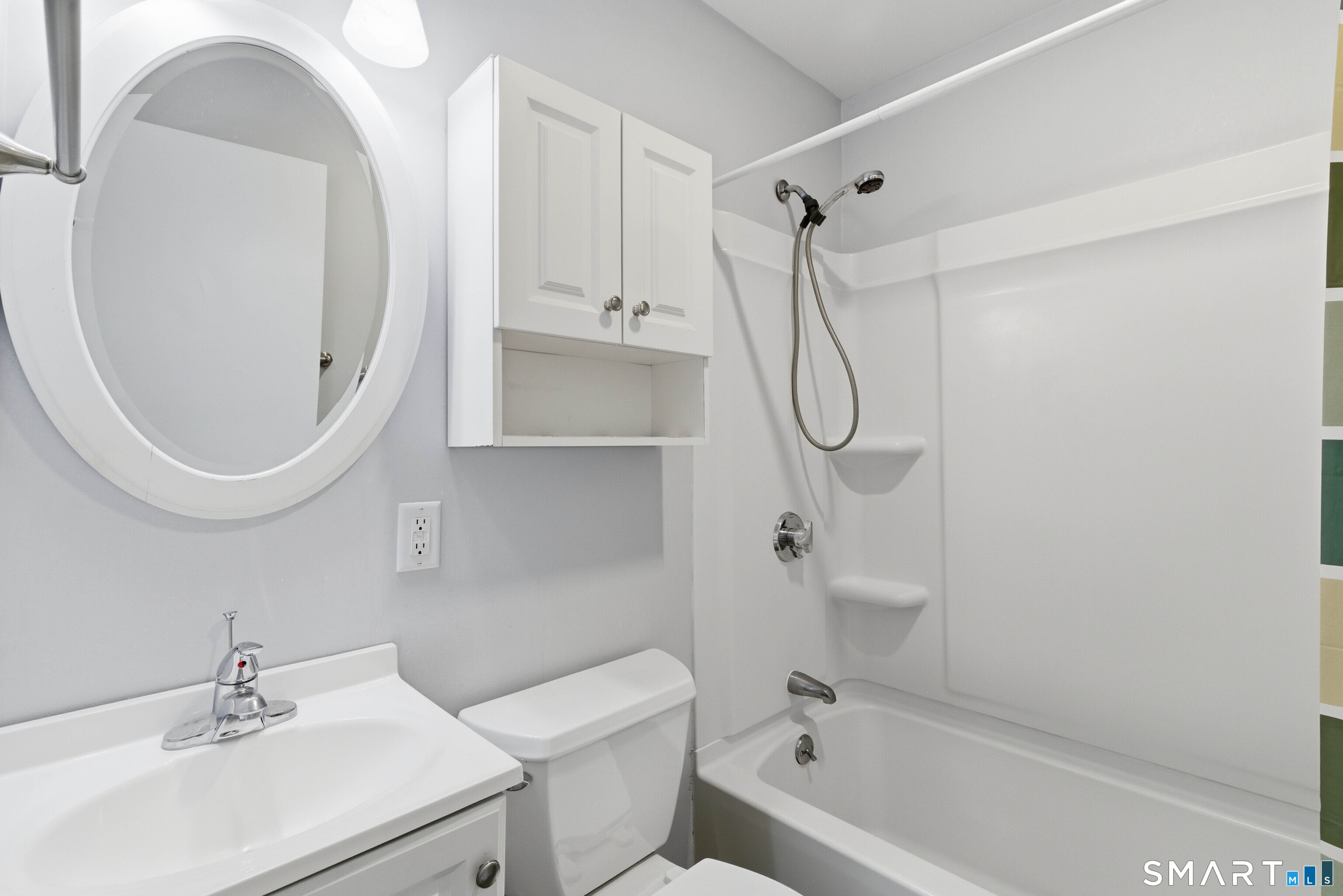 32 Concord Court Groton, CT 06340 - Photo 8 of 24 a bathroom with a sink a toilet and a mirror