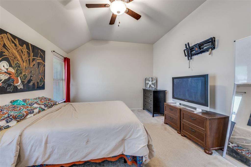 8233 Edgepoint Trail Fort Worth, TX 76053 - Photo 20 of 36 a bedroom with a bed dresser and a window