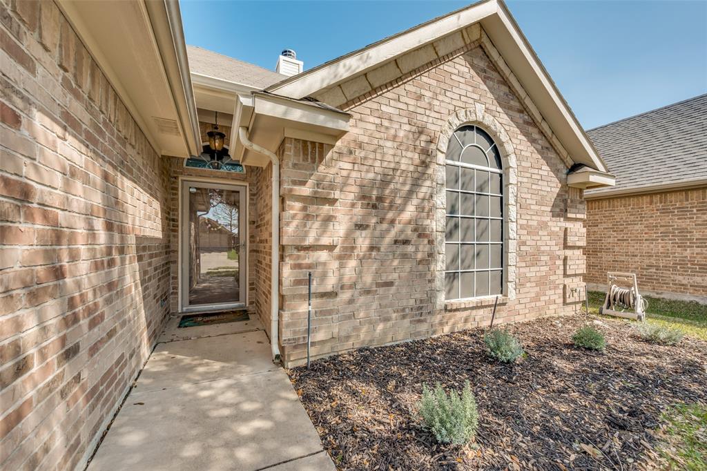 8233 Edgepoint Trail Fort Worth, TX 76053 - Photo 2 of 36 a view of a back yard of the building