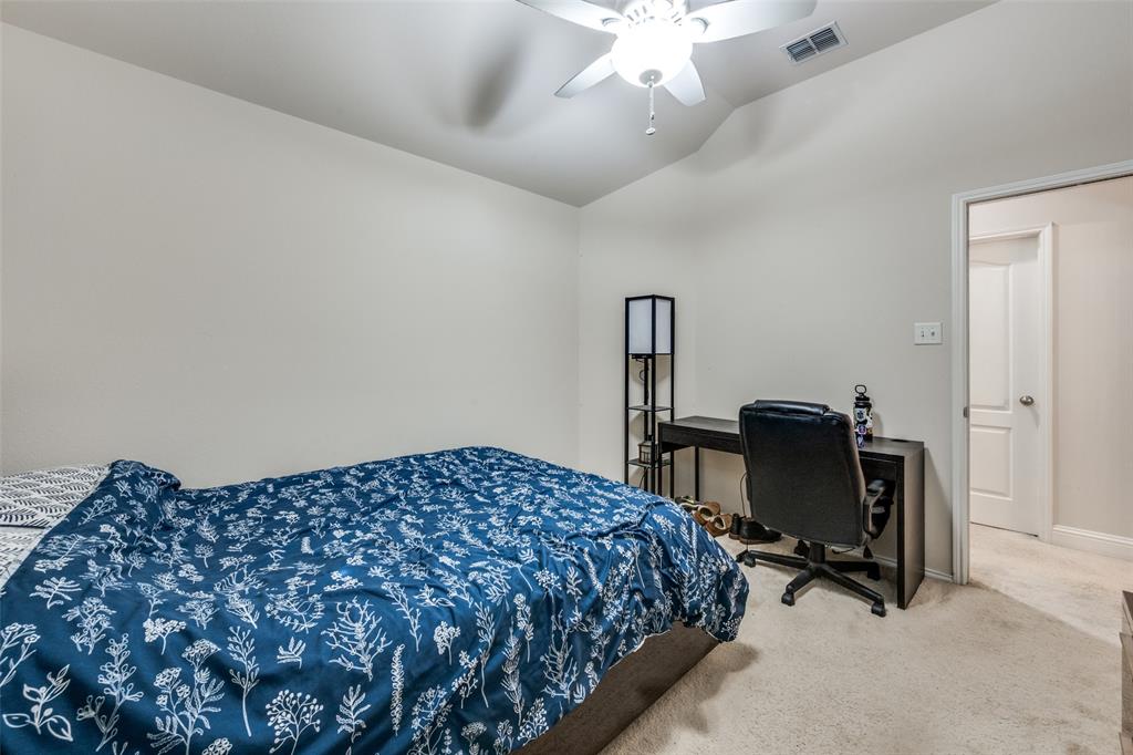 8233 Edgepoint Trail Fort Worth, TX 76053 - Photo 25 of 36 a bedroom with bed and a window