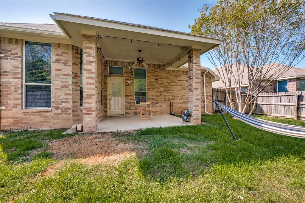 8233 Edgepoint Trail Fort Worth, TX 76053 - Photo 32 of 36 a view of a back yard of the house