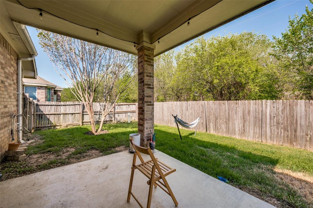 8233 Edgepoint Trail Fort Worth, TX 76053 - Photo 34 of 36 a view of a porch with a backyard