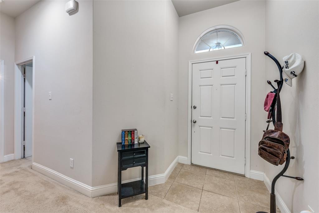 8233 Edgepoint Trail Fort Worth, TX 76053 - Photo 4 of 36 a view of a livingroom with storage and utility
