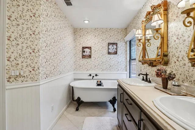 a bathroom with a sink and a bathtub