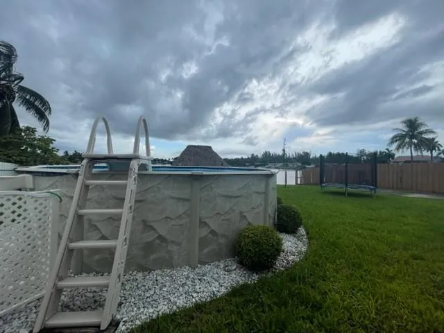 a view of a back yard of the house