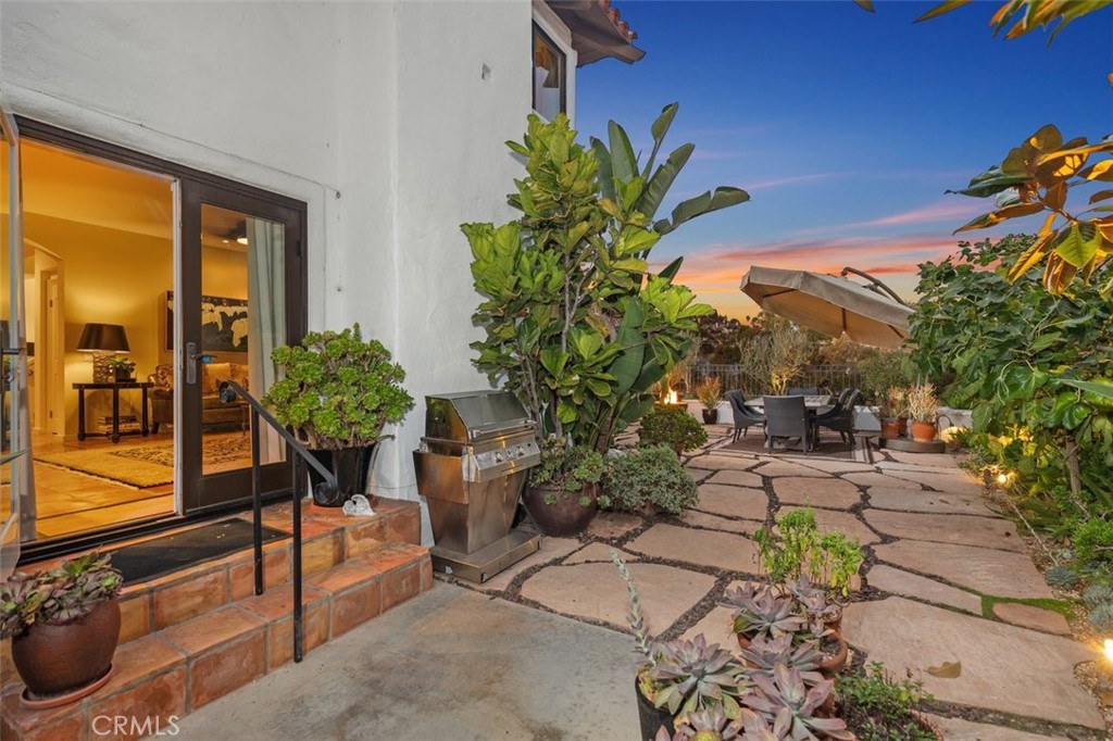 12 Terraza Del Mar Dana Point, CA 92629 - Photo 11 of 52 a backyard of a house with table and chairs