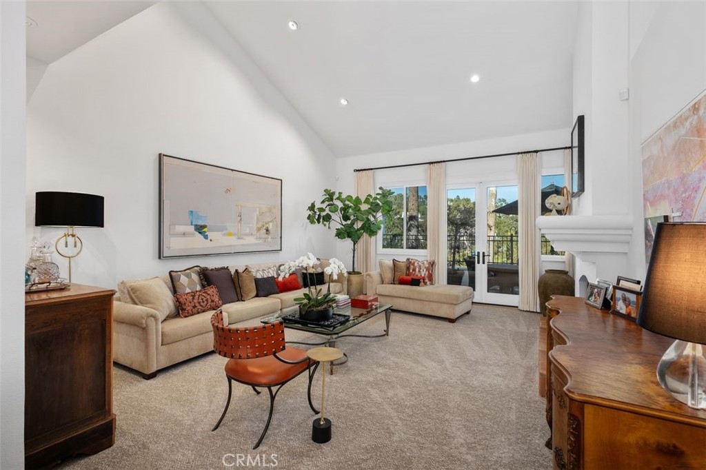 12 Terraza Del Mar Dana Point, CA 92629 - Photo 16 of 52 a living room with furniture and a flat screen tv