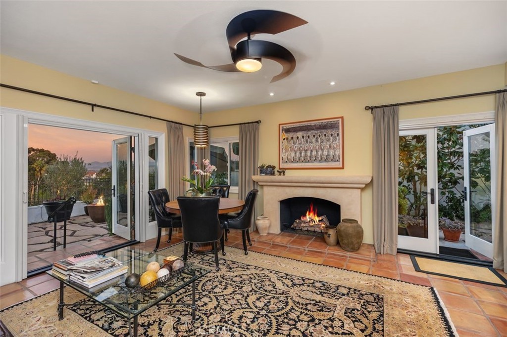 12 Terraza Del Mar Dana Point, CA 92629 - Photo 2 of 52 a living room with furniture and a fireplace