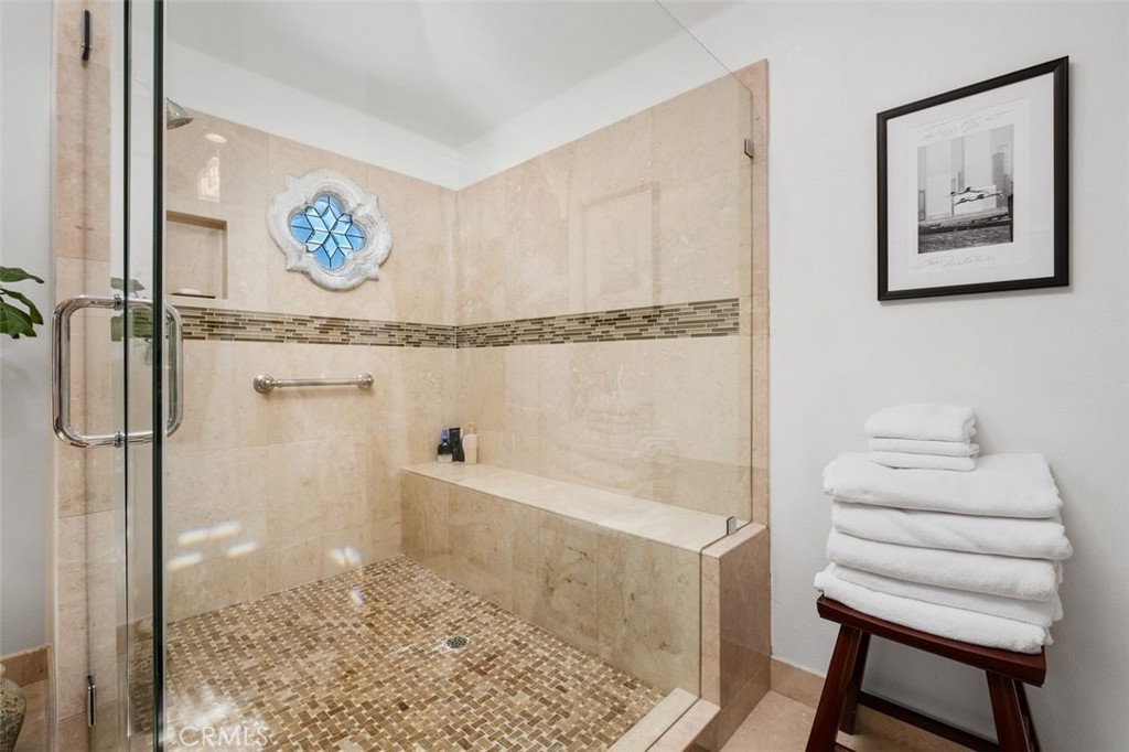 12 Terraza Del Mar Dana Point, CA 92629 - Photo 32 of 52 a bathroom with a bathtub and a shower