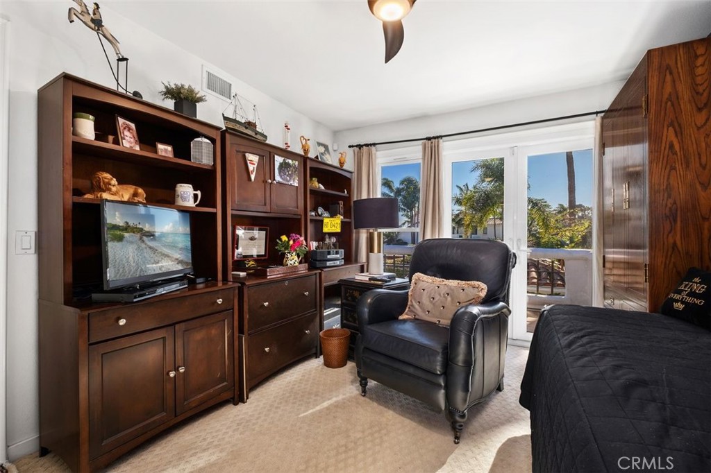 12 Terraza Del Mar Dana Point, CA 92629 - Photo 37 of 52 a living room with furniture and a flat screen tv