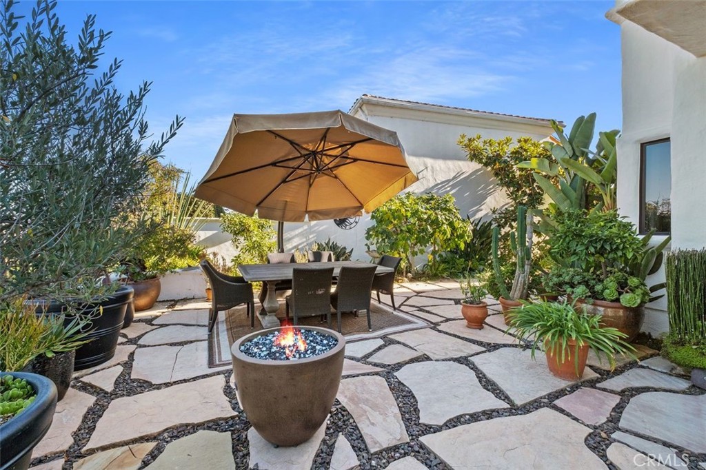12 Terraza Del Mar Dana Point, CA 92629 - Photo 39 of 52 a view of a chair and table in backyard