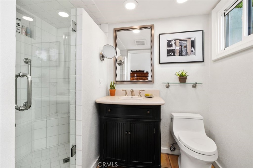12 Terraza Del Mar Dana Point, CA 92629 - Photo 46 of 52 a bathroom with a toilet sink shower and mirror