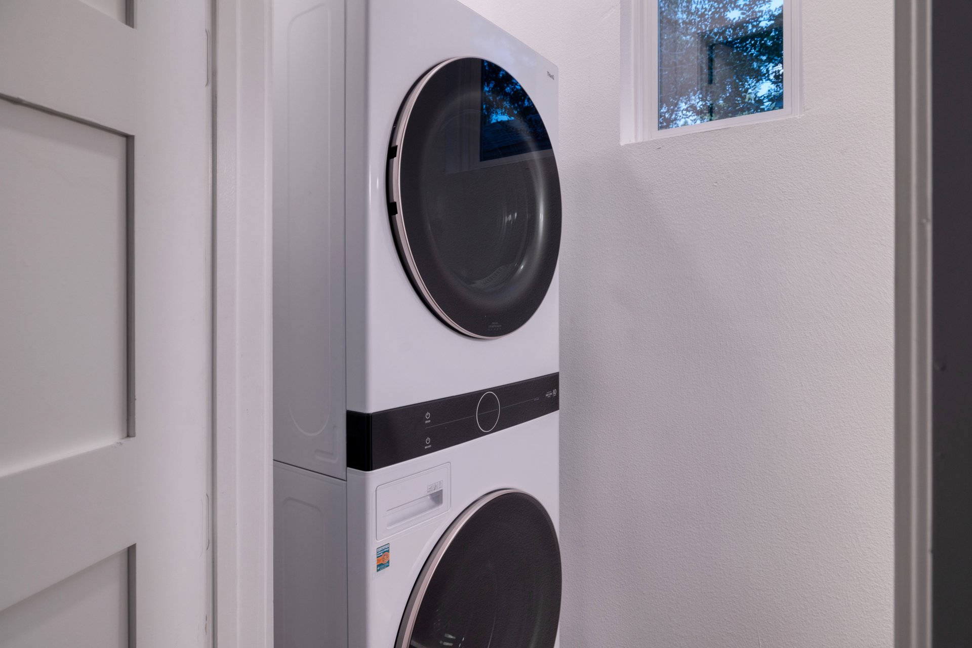 3911 Duval Street, Unit 2 Austin, TX 78751 - Photo 16 of 39 a close up view of a washer and dryer