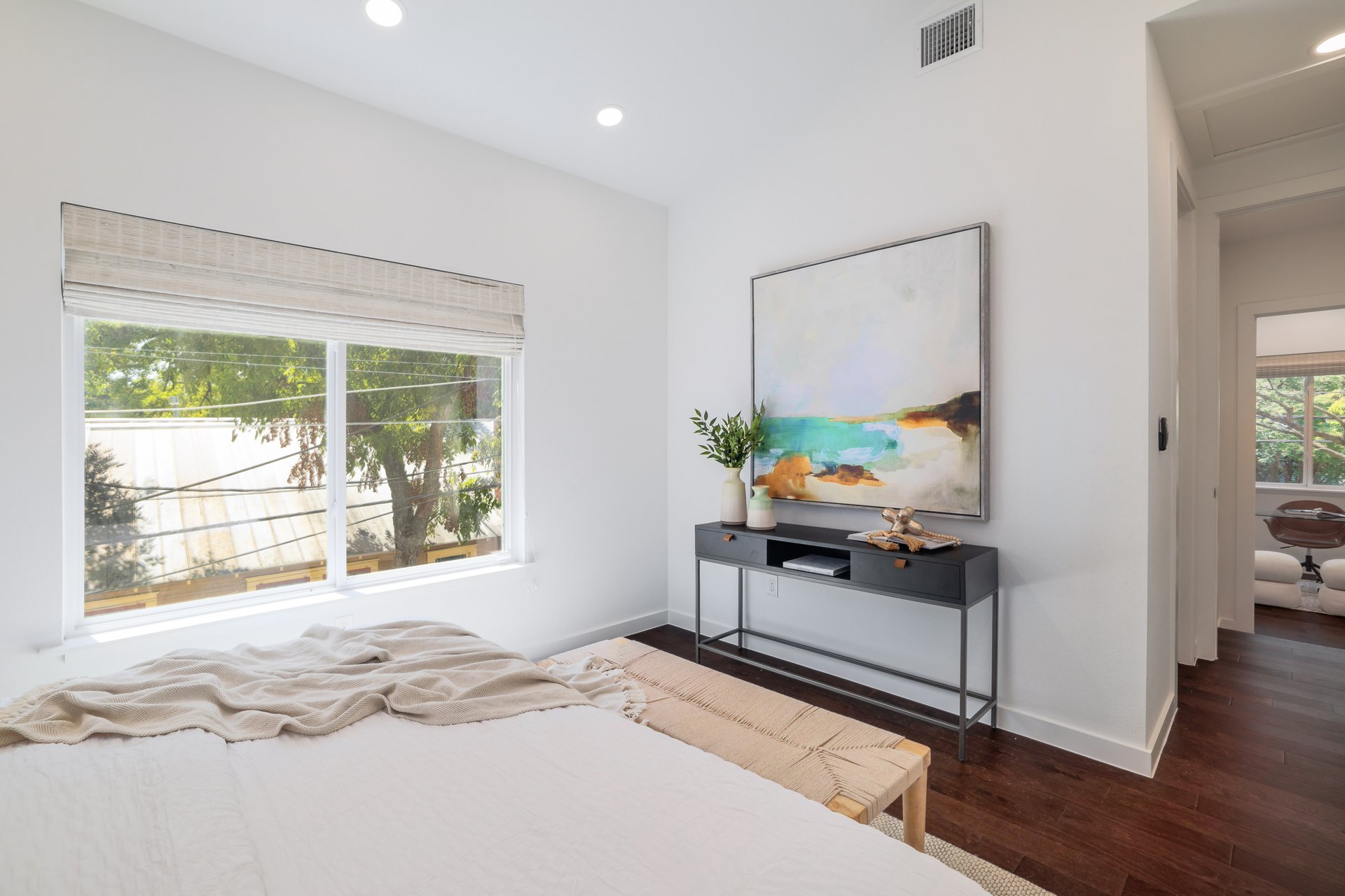 3911 Duval Street, Unit 2 Austin, TX 78751 - Photo 18 of 39 a living room with a bed furniture and a window