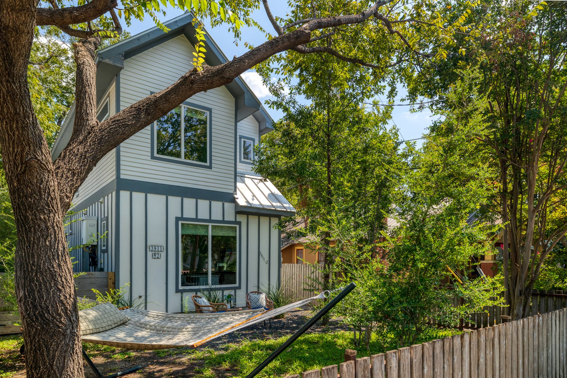 3911 Duval Street, Unit 2 Austin, TX 78751 - Photo 2 of 39 front view of a house with a tree