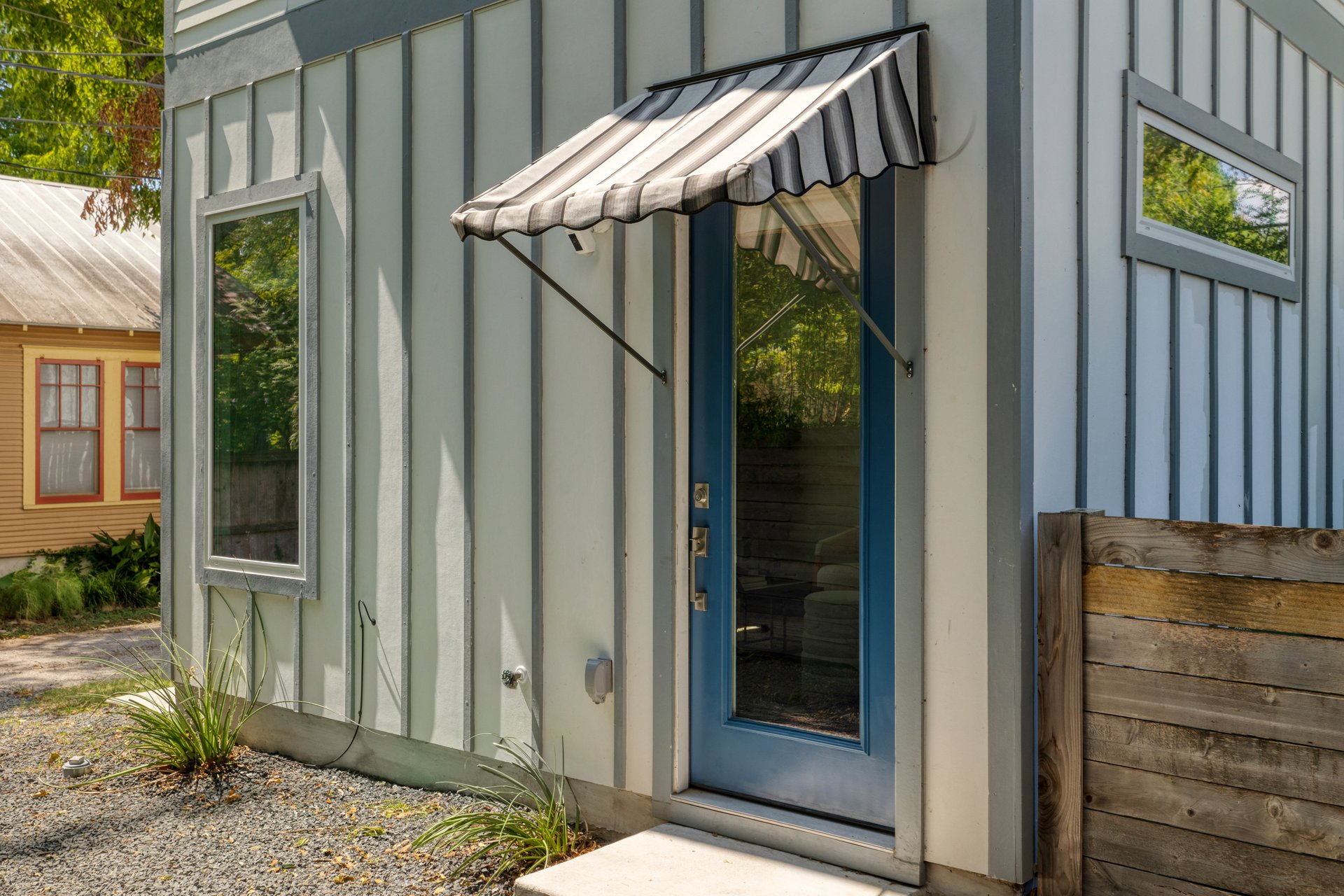 3911 Duval Street, Unit 2 Austin, TX 78751 - Photo 27 of 39 a view of a door and a window of the house