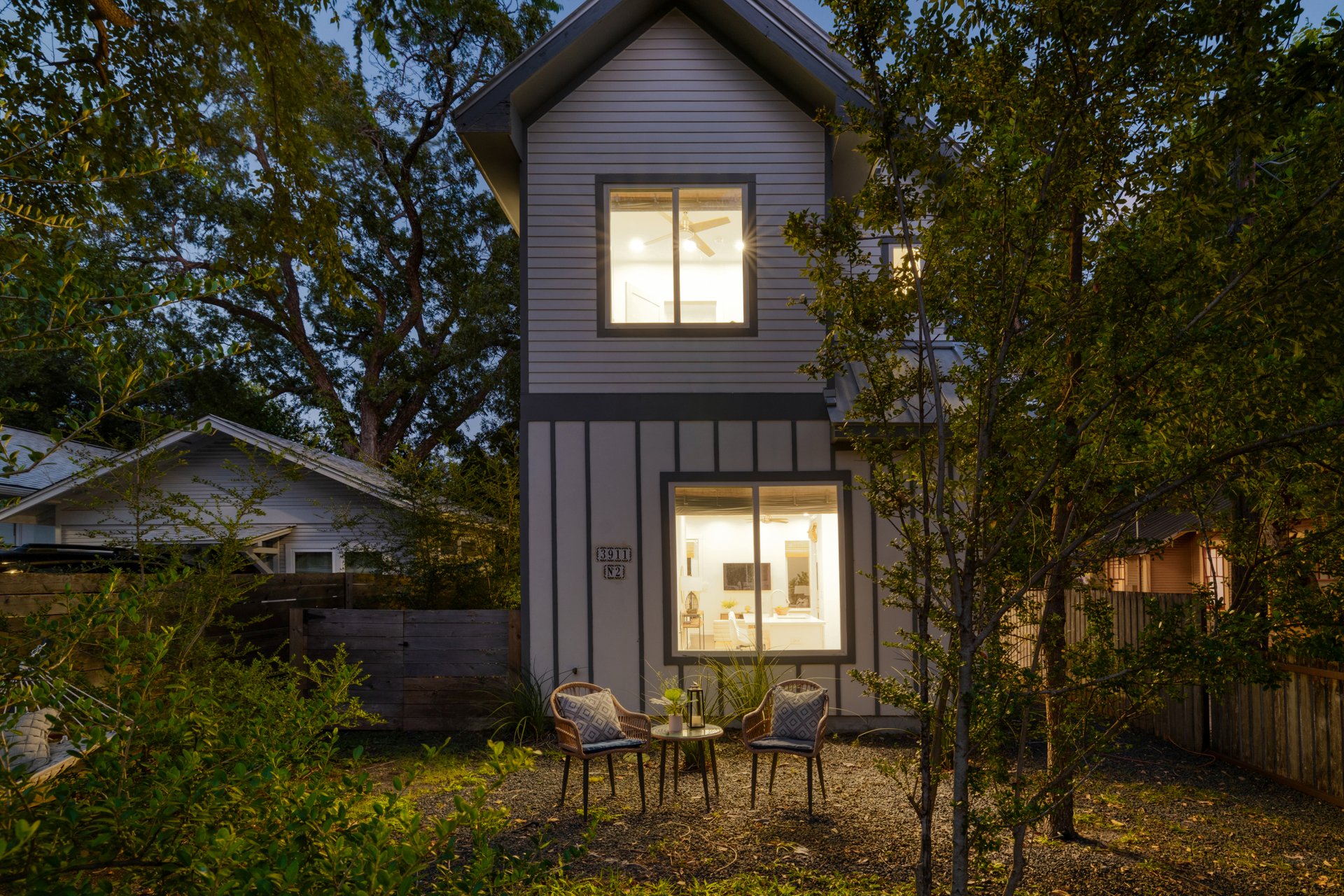 3911 Duval Street, Unit 2 Austin, TX 78751 - Photo 34 of 39 a front view of a house with a yard
