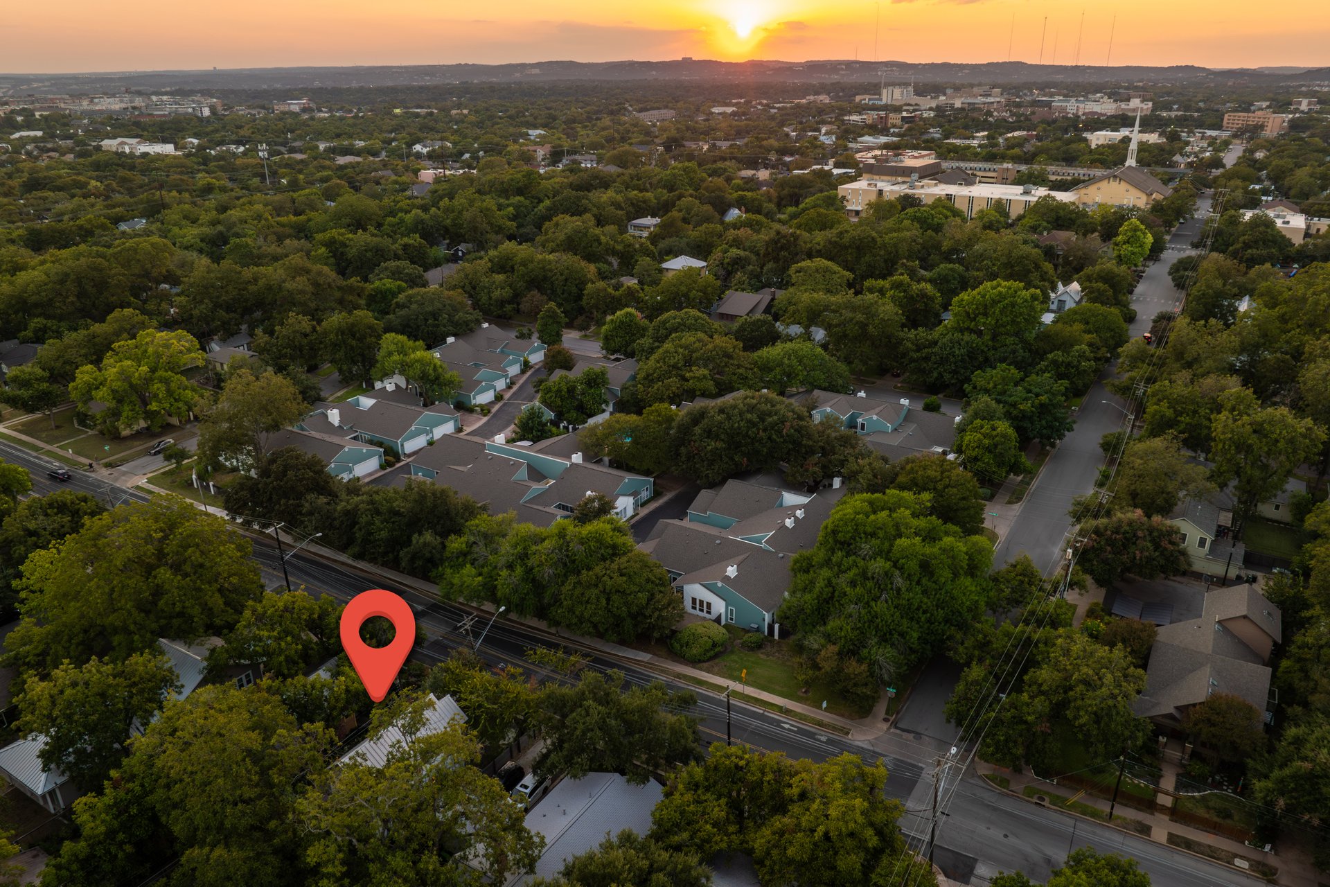 3911 Duval Street, Unit 2 Austin, TX 78751 - Photo 35 of 39 an aerial view of a house and a mountain view