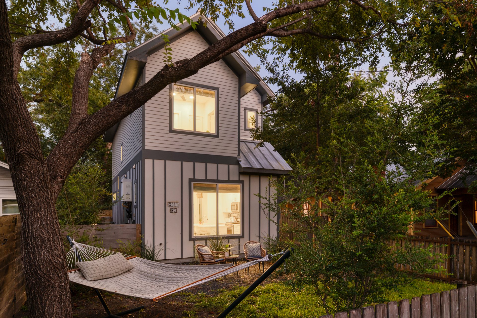 3911 Duval Street, Unit 2 Austin, TX 78751 - Photo 4 of 39 a front view of a house with a yard