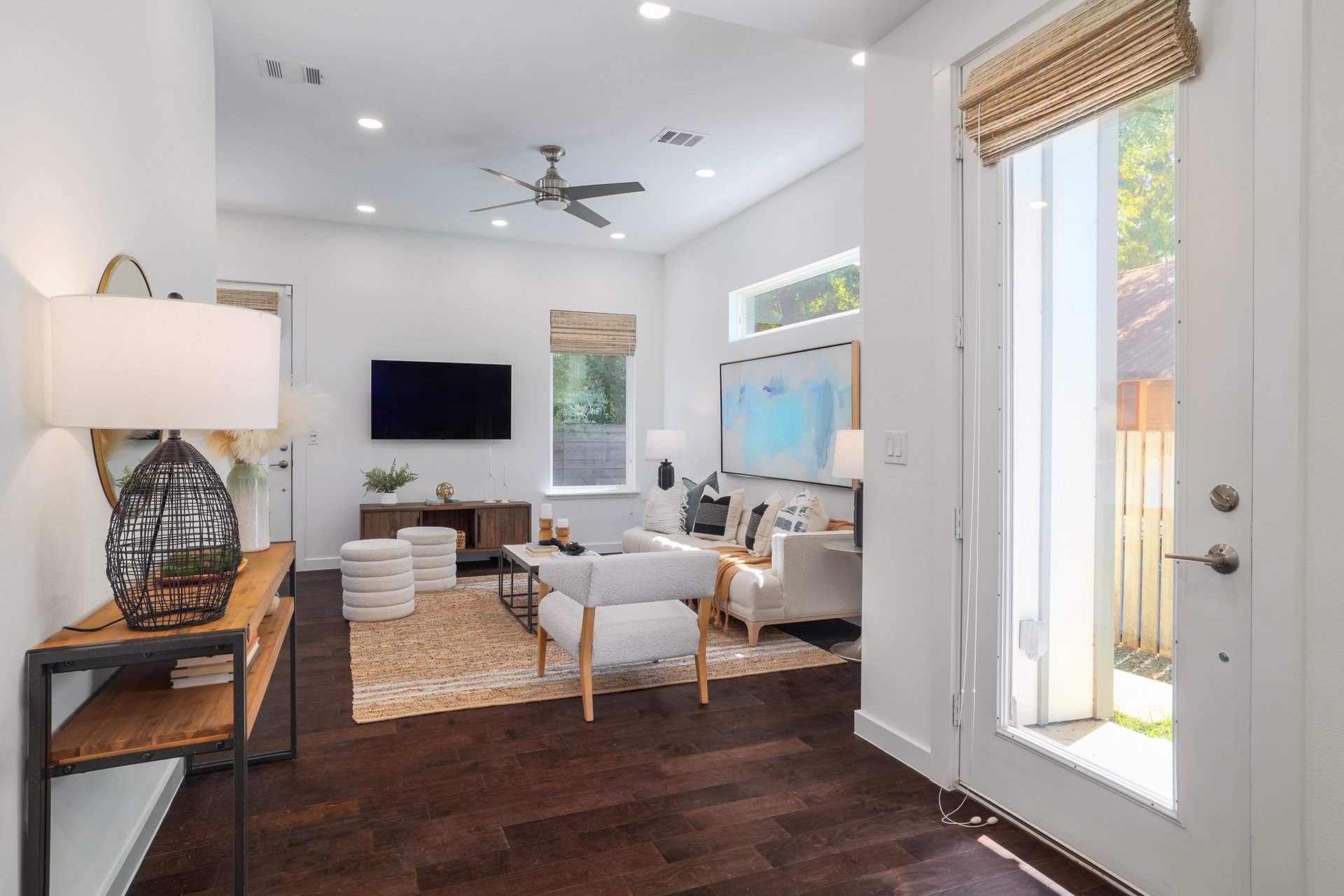 3911 Duval Street, Unit 2 Austin, TX 78751 - Photo 9 of 39 a living room with furniture and a flat screen tv