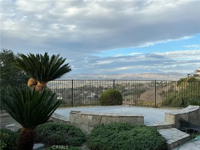 a view of a lake with a yard