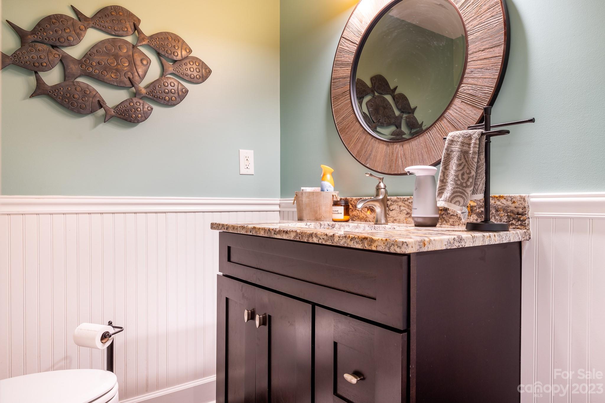 3119 Lake Shore Road South Denver, NC 28037 - Photo 14 of 35 a bathroom with a sink and a mirror
