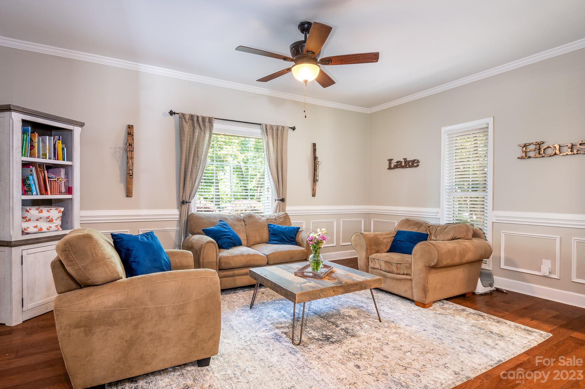 3119 Lake Shore Road South Denver, NC 28037 - Photo 16 of 35 a living room with furniture and a rug