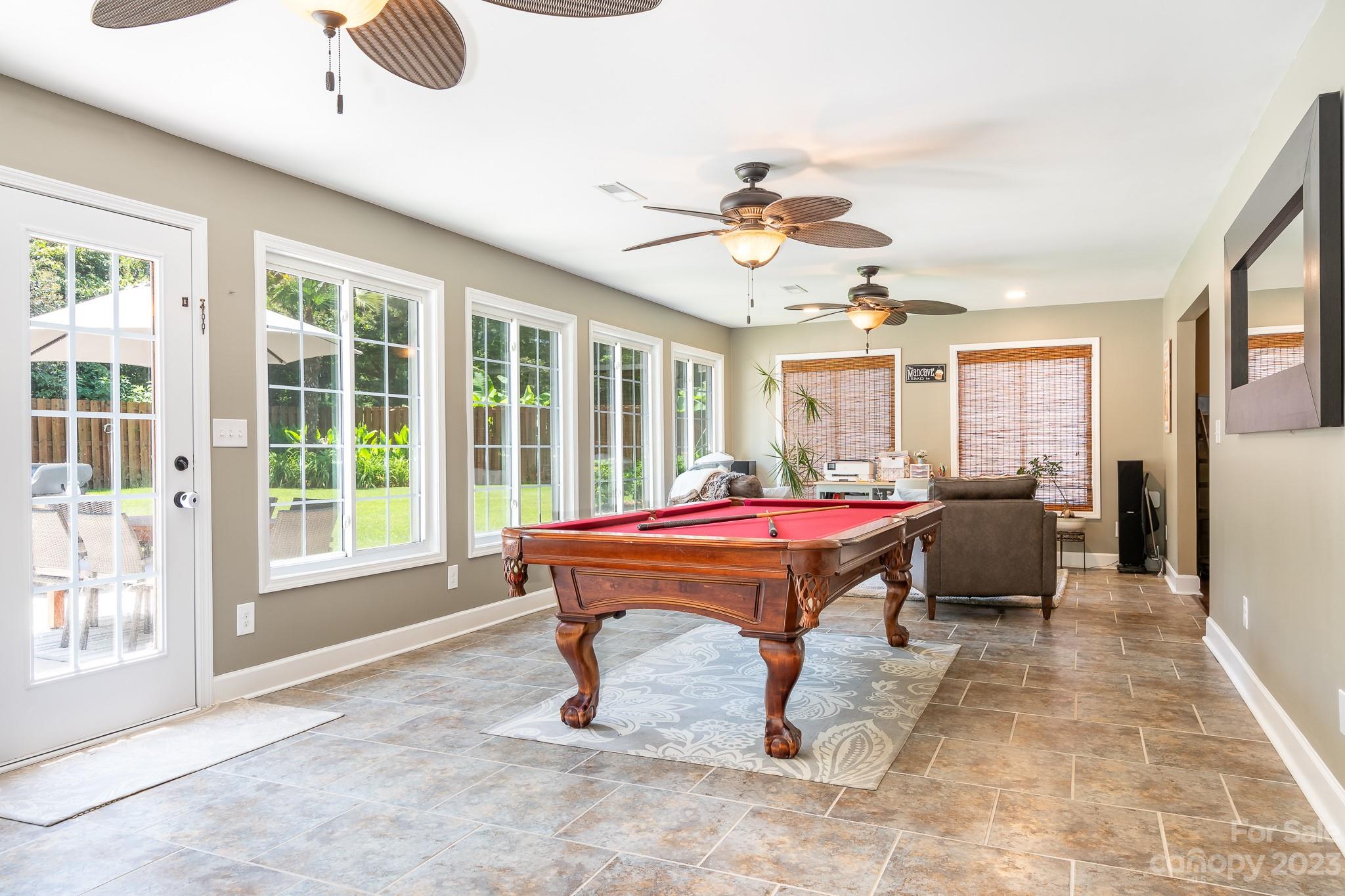 3119 Lake Shore Road South Denver, NC 28037 - Photo 18 of 35 a room with pool table and windows