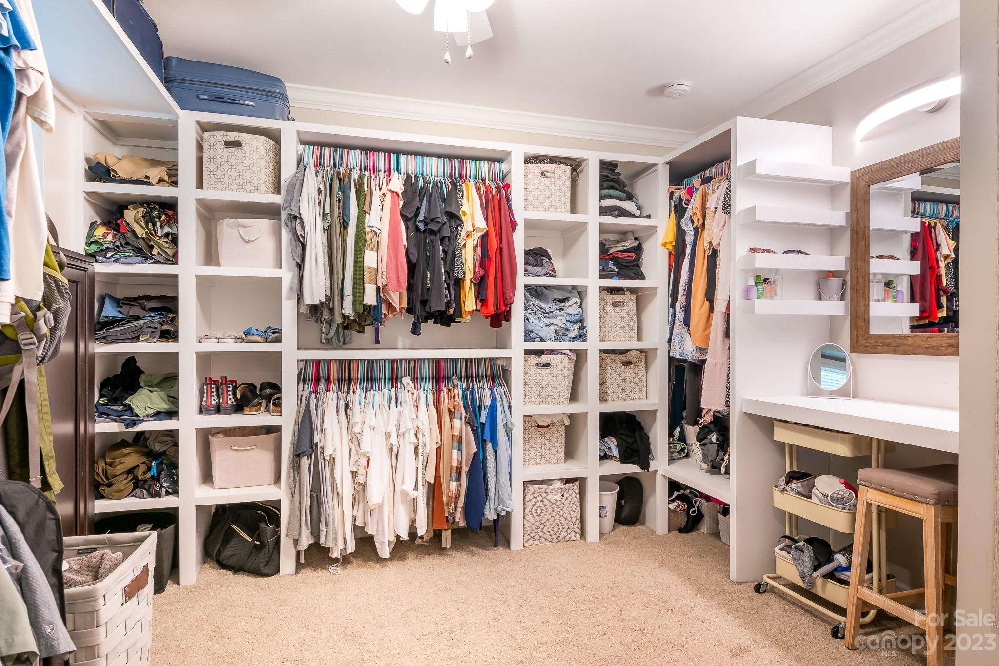 3119 Lake Shore Road South Denver, NC 28037 - Photo 23 of 35 a view of walk in closet with clothes and shoes